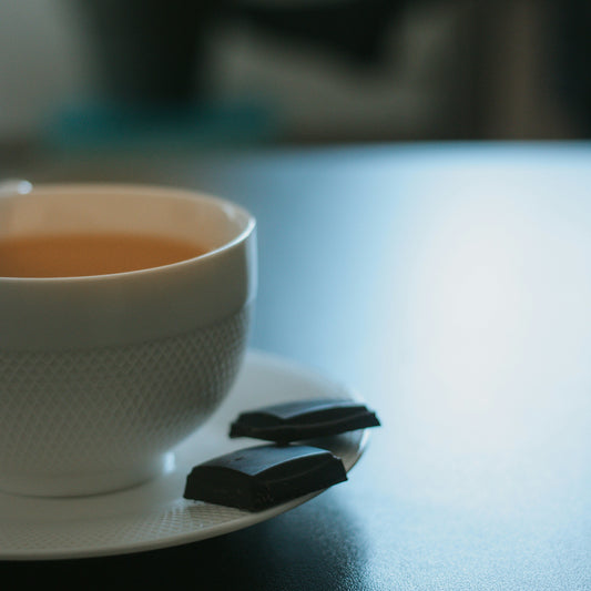 The Serenity Ensemble: White ceramic teapot with signature white tea tins for an afternoon ritual. | Cove Tea Co